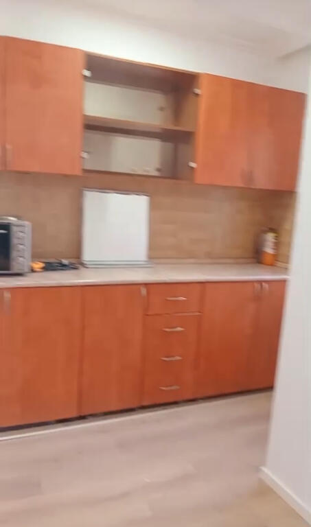 A 1+1 apartment is available for rent near 21 Dhjetori.