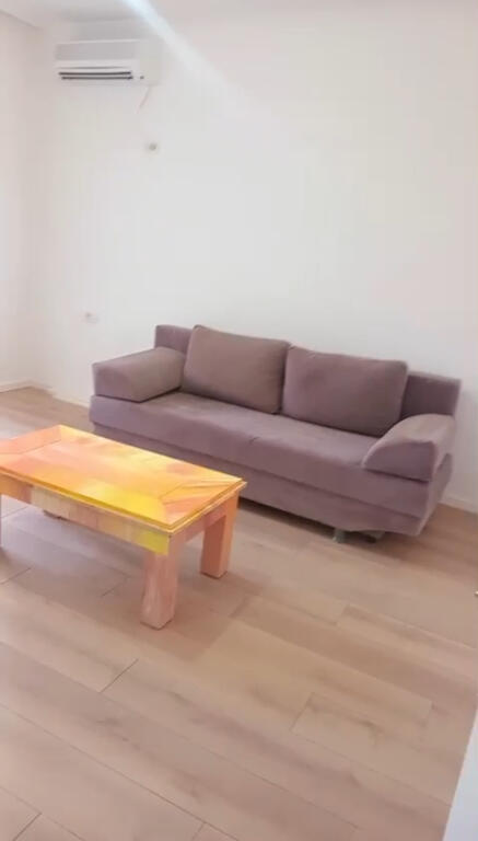 A 1+1 apartment is available for rent near 21 Dhjetori.