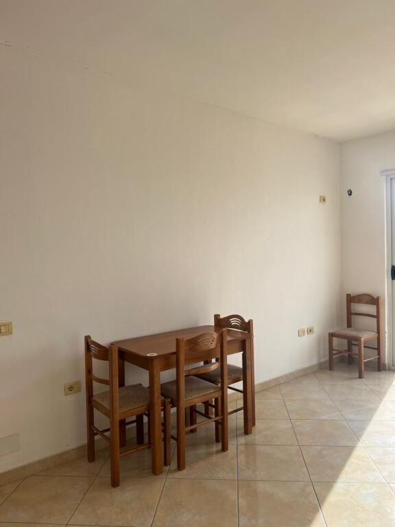 A 2+1 apartment is available for rent in Qesarake, near the Murages restaurant.