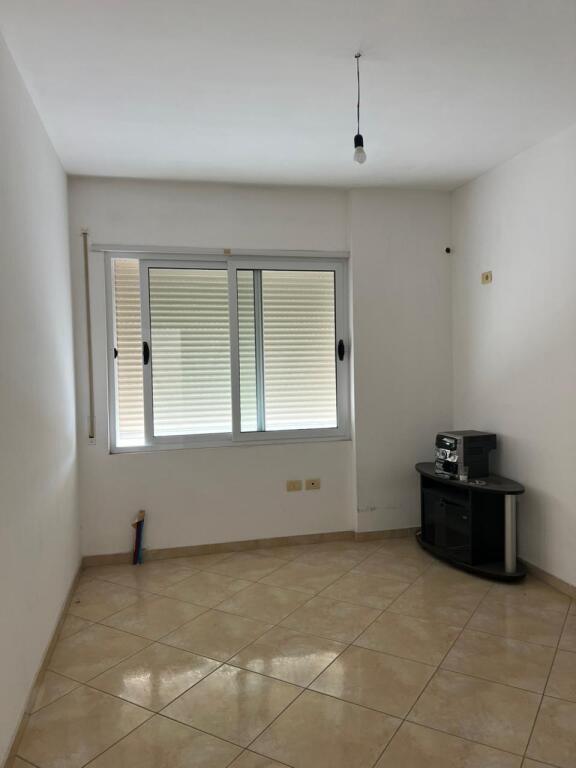 A 2+1 apartment is available for rent in Qesarake, near the Murages restaurant.