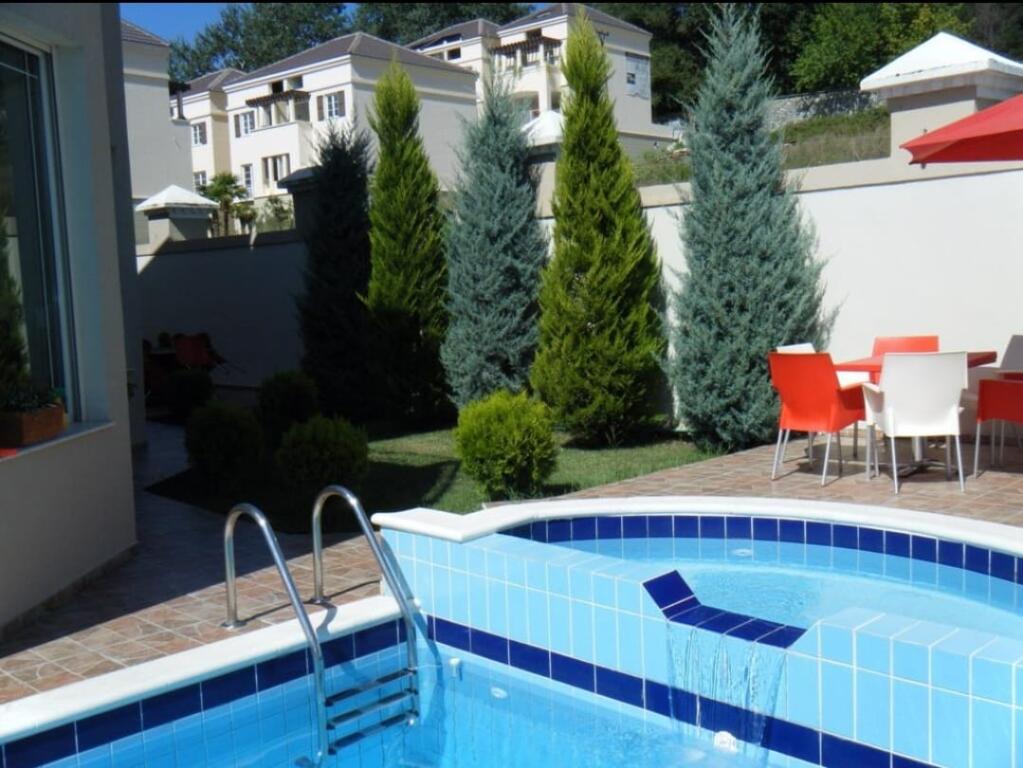 A 3-story villa is for rent next to the Brigades Palace.