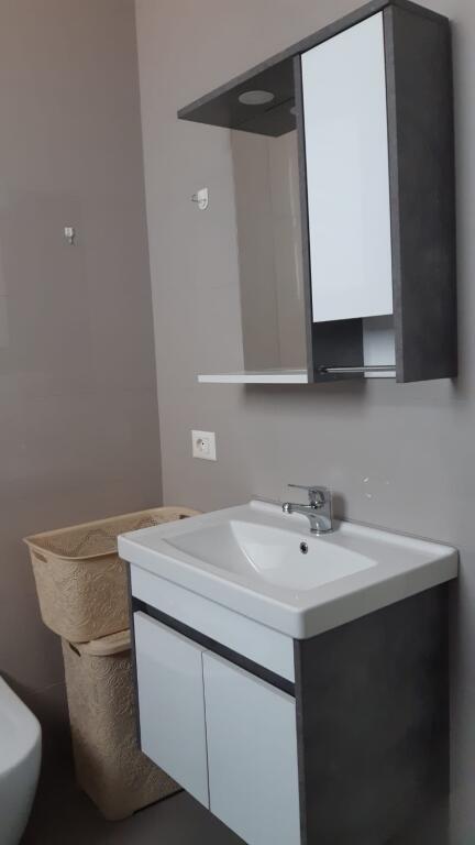 A 1+1 apartment is available for rent at the Kamez turn.