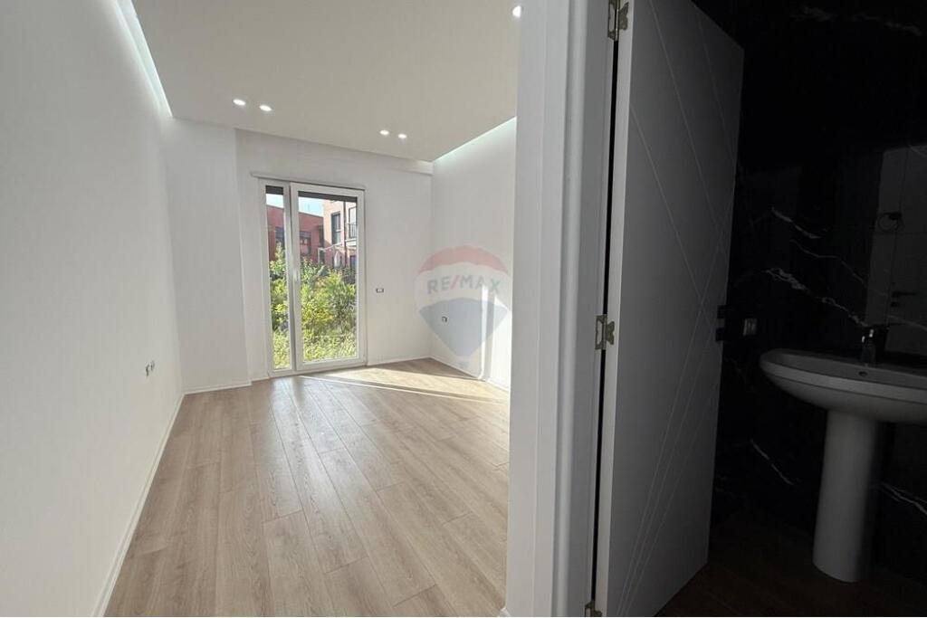 2+1 apartment with yard for sale TEG.