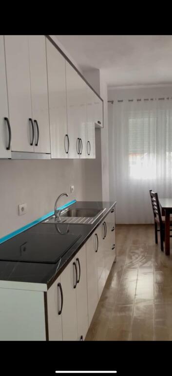 For rent 2+1+2 in Kamez near Ulliri. The apartment has an area of 110 m2 and is located on the 2nd floor of a newly completed building with an elevator. It is organized into: Living room + Kitchen 2 bedrooms 2 bathrooms Balcony Totally furnished, located in an easily accessible area. Location: Kamez, Donald Trump street.
