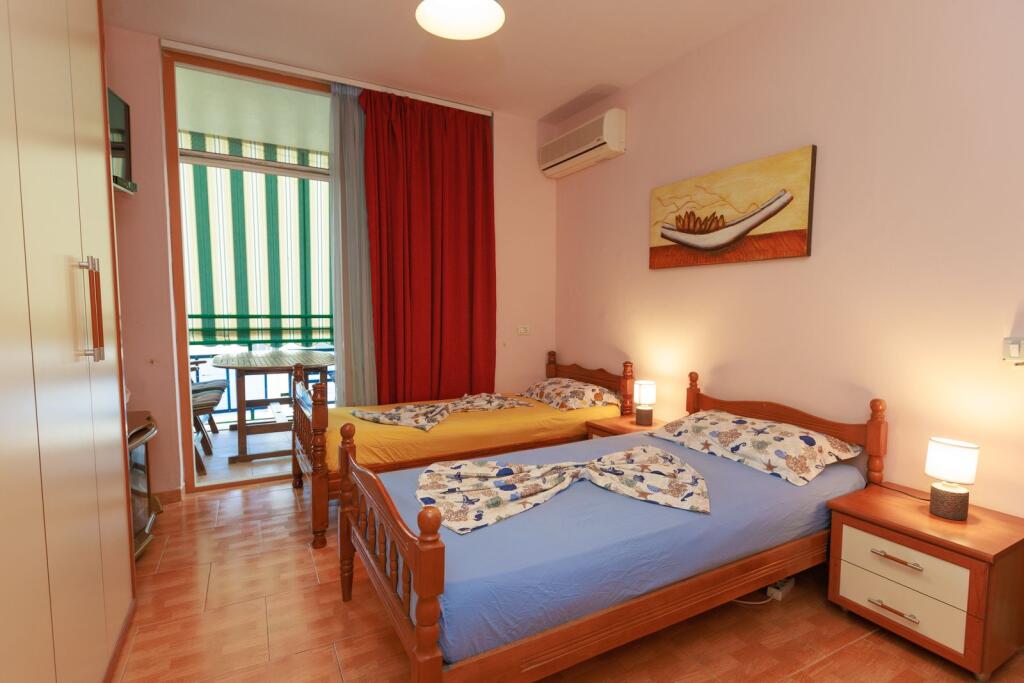FOR SALE SUPER APARTMENT 2+1+2 WITH SEA VIEW IN GOLEMI BEACH