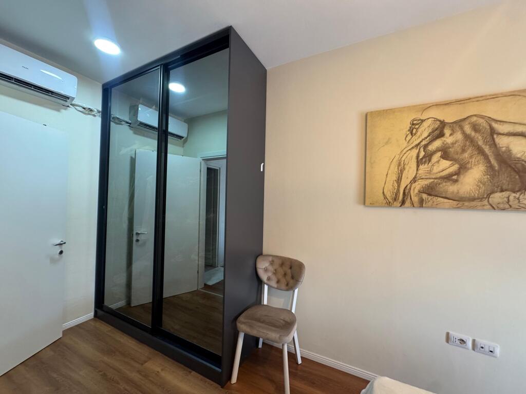 I am selling a 1+1 apartment with parking space on Kavaja Street.