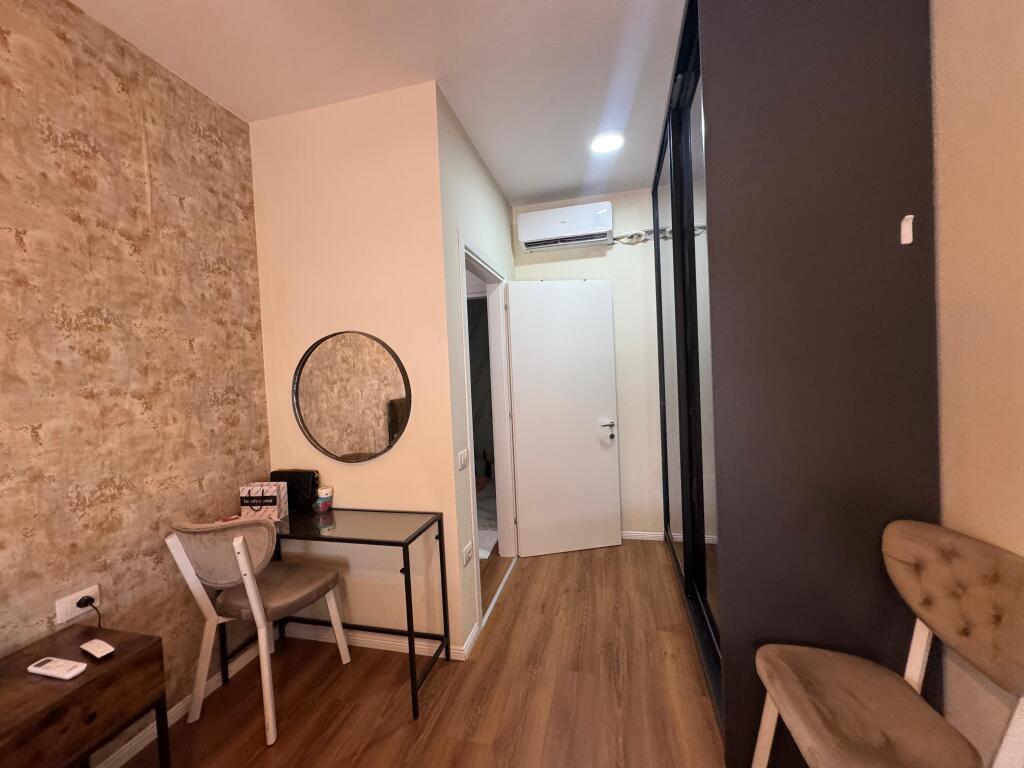 I am selling a 1+1 apartment with parking space on Kavaja Street.