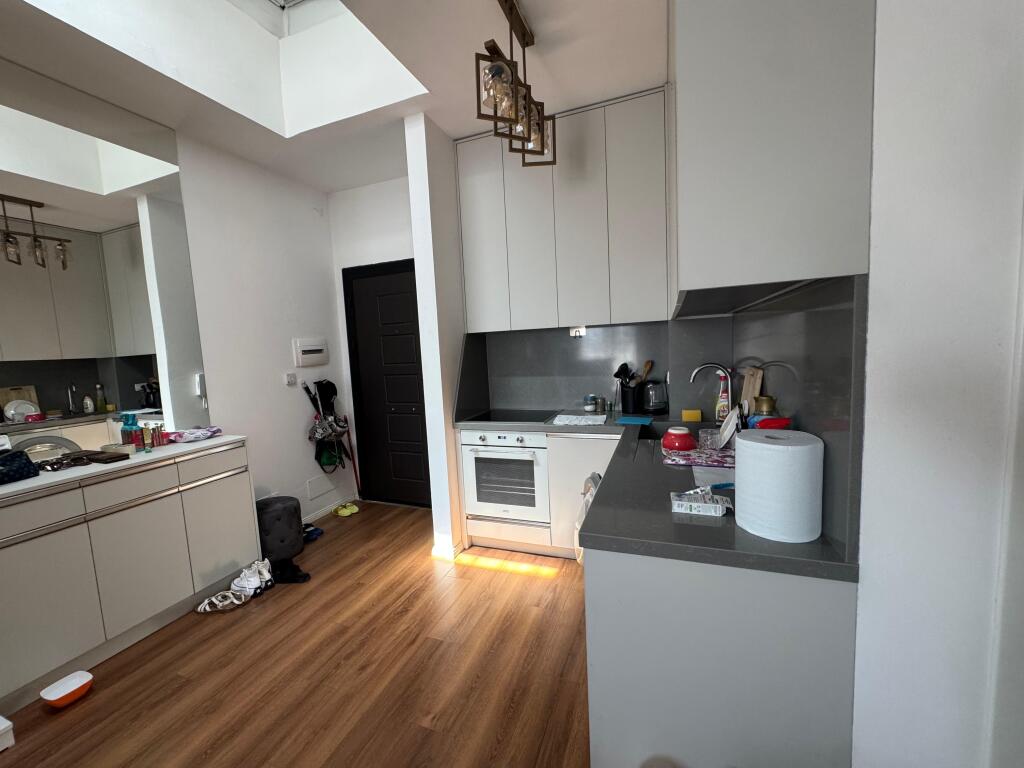 I am selling a 1+1 apartment with parking space on Kavaja Street.