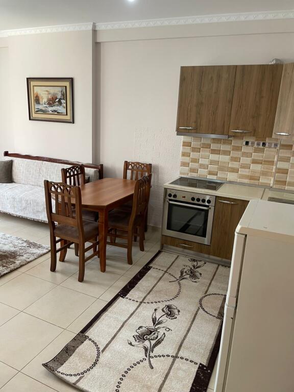 An apartment 1+1 is for rent behind the artist's bar, Astir.