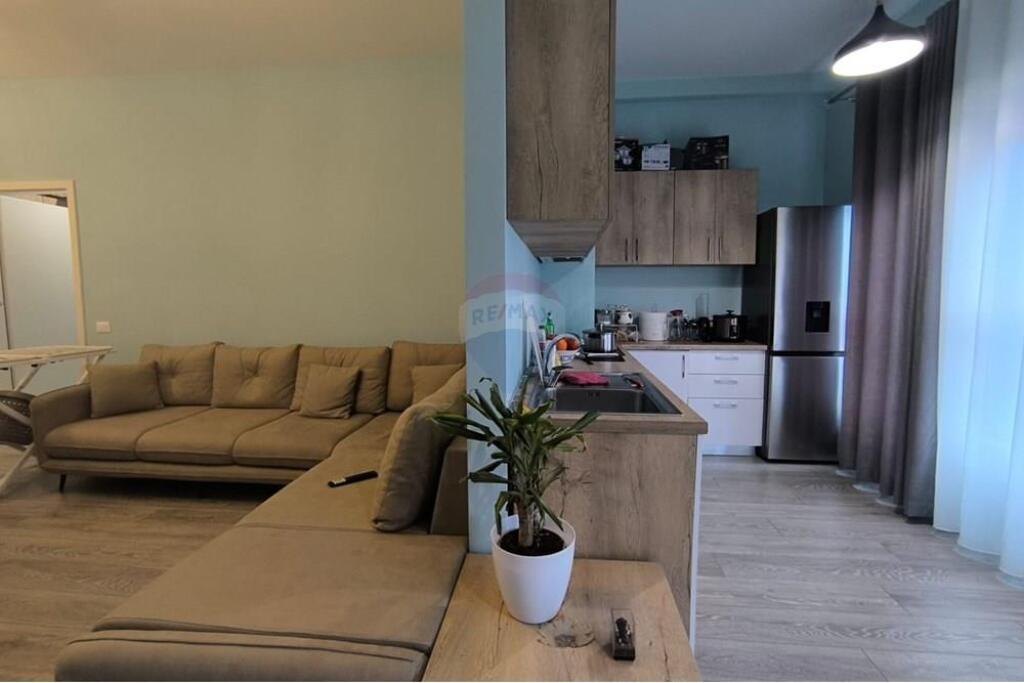The apartment is located at Mangalem Complex, Ali Demi.