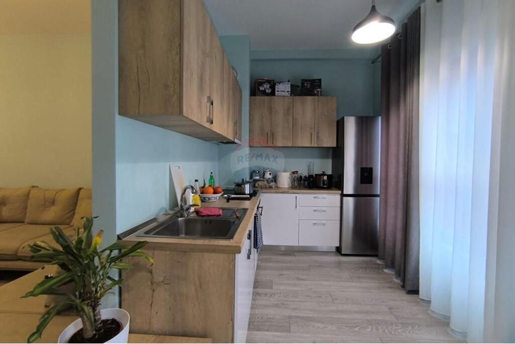 The apartment is located at Mangalem Complex, Ali Demi.