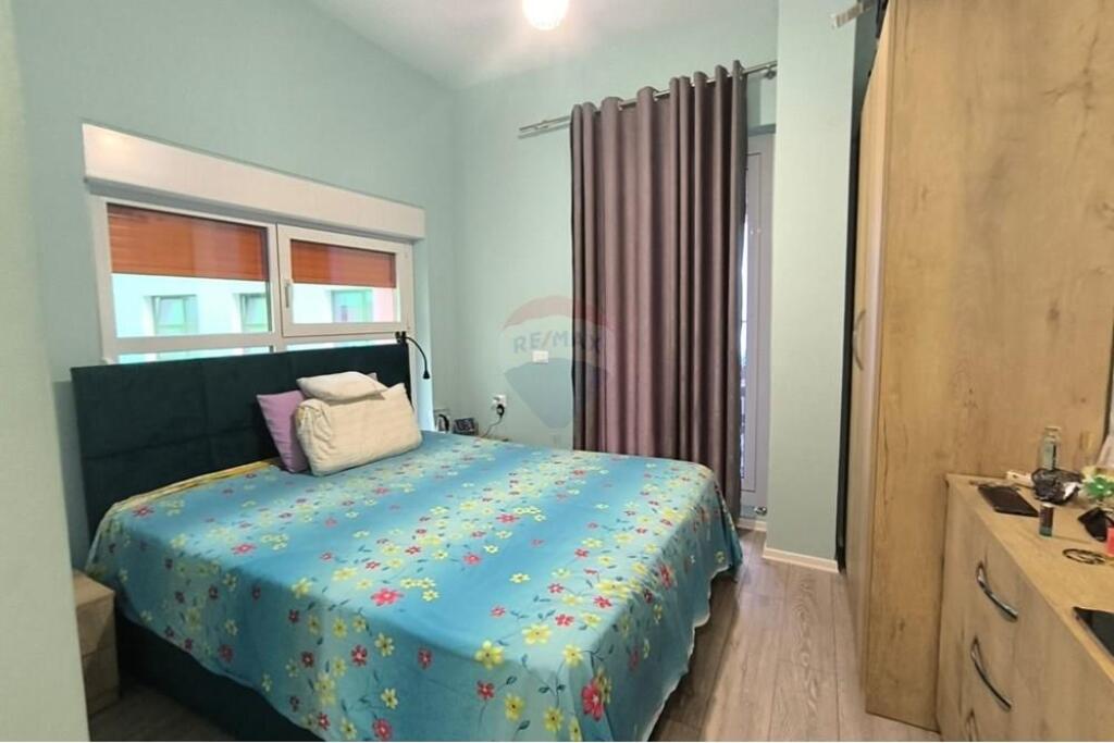 The apartment is located at Mangalem Complex, Ali Demi.