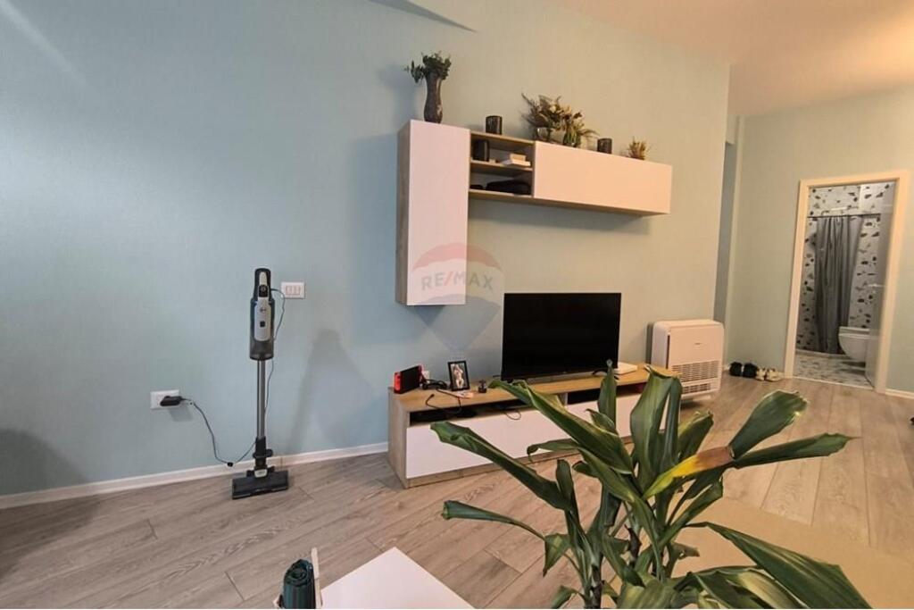 The apartment is located at Mangalem Complex, Ali Demi.