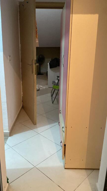 A studio apartment is for rent in a 4-story villa located on the first floor.