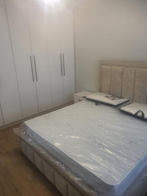 At Willson Square, Sami Frasheri St, a furnished 1+1 apartment is for rent.