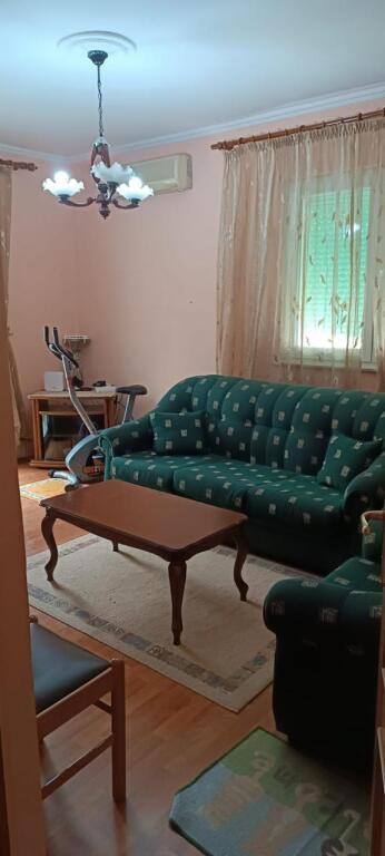 An apartment 2+1 is for rent near the center in Tirana.