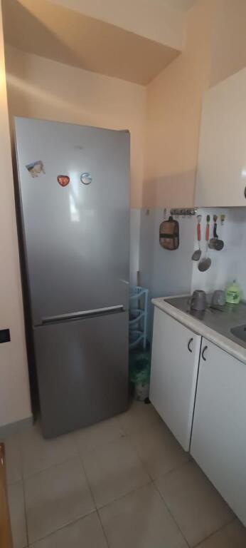 An apartment 2+1 is for rent near the center in Tirana.