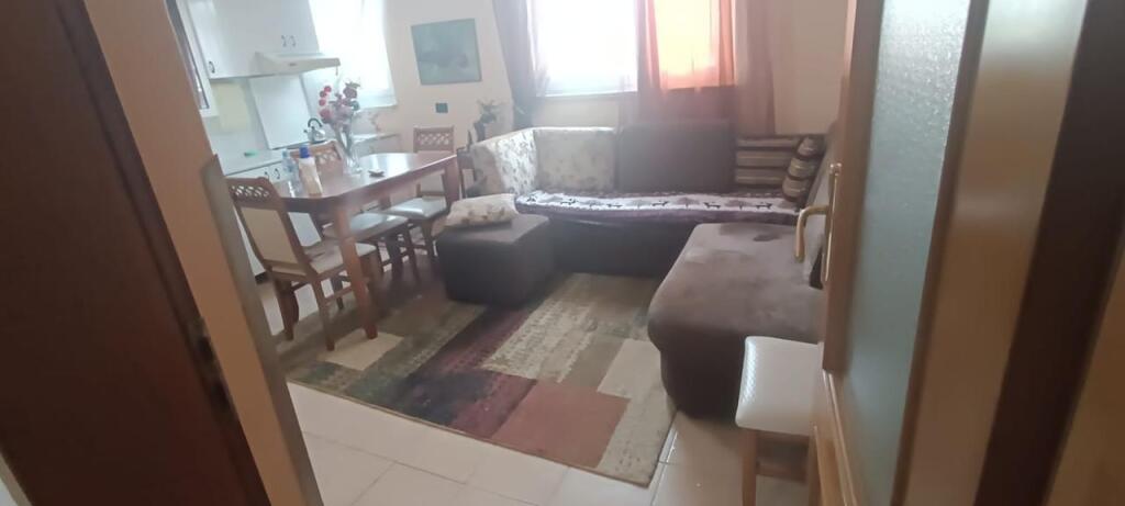 An apartment 2+1 is for rent near the center in Tirana.