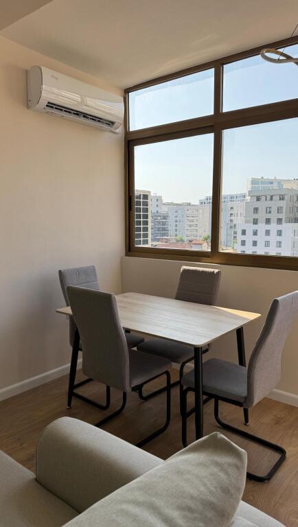 In the area of December 21, near Hotel Mondial, a 2+1 apartment is for rent, partially furnished.