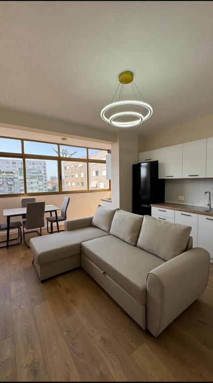 In the area of December 21, near Hotel Mondial, a 2+1 apartment is for rent, partially furnished.
