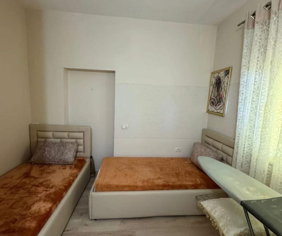 For sale a 2-story villa in a quiet area of the village, with quick access to the center, Kavajë.