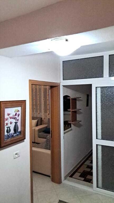In front of the New Maternity Hospital, Koco Glozheni offers a furnished 2+1 apartment for rent.