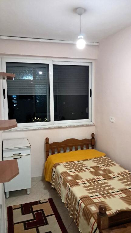 In front of the New Maternity Hospital, Koco Glozheni offers a furnished 2+1 apartment for rent.