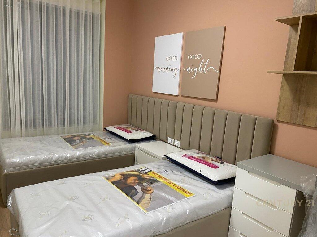 🏢 For Rent: 2+1+2 Apartment near Former Train Station – Beginning of New Boulevard (Blv. i Ri)  📍 Strategic location in one of Tirana’s most connected areas, with immediate access to main roads and just steps from the New Boulevard.  📐 Total area: 94 m² 🏢 Floor: 4th in a new 8-story building with elevator 🛋 Modern furnishing – exactly as shown in photos!  🛏 Apartment Layout: ▪ Living area + open kitchen ▪ 2 bedrooms ▪ 2 bathrooms (one with natural ventilation) ▪ 1 balcony ▪ Central hallway  🚗 Dedicated parking space – available for an additional 5,000 ALL/month  🔒 Quiet, safe, and family-friendly environment 🐾 Pets are not allowed ✅ Families preferred 📦 Available immediately  📞 For more information or to schedule a viewing, contact us at: 📲 0685000221