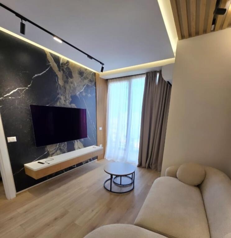 GJIMNAZI PARTIZANI Shesim apartament me garazhd 1+1.