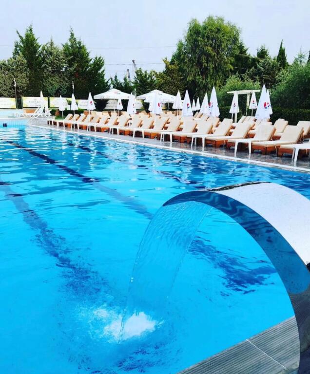 Business property suitable for a venue  hotel with a pool and yard for sale or rent
