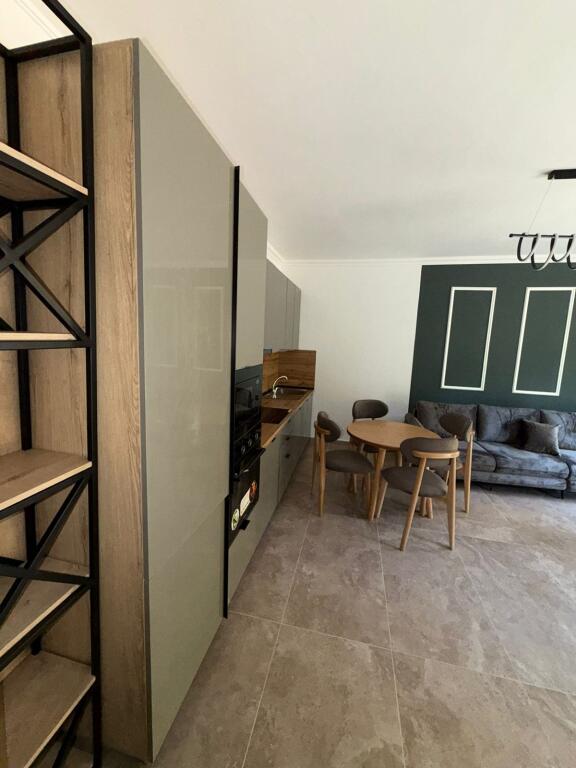 Apartment for sale in the Shkëmbi i Kavajës area, type 1+1 with veranda and storage room.