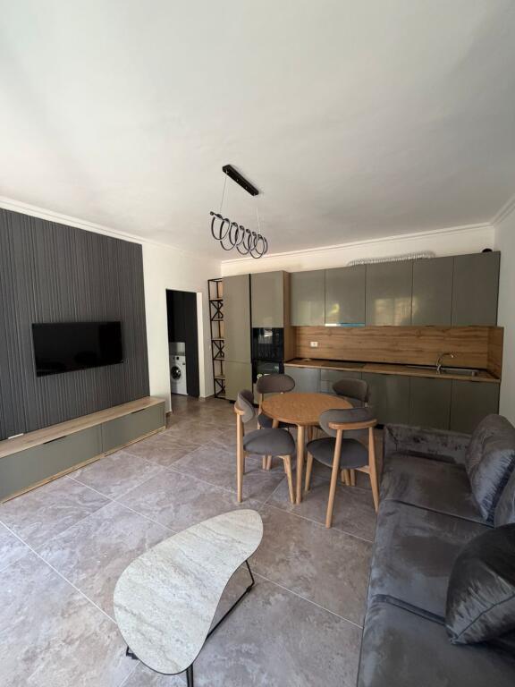Apartment for sale in the Shkëmbi i Kavajës area, type 1+1 with veranda and storage room.