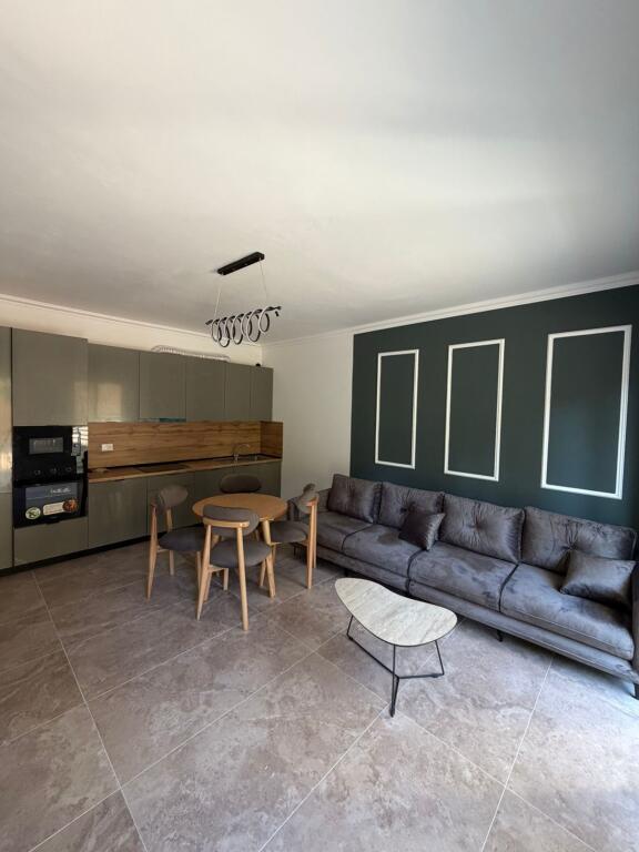 Apartment for sale in the Shkëmbi i Kavajës area, type 1+1 with veranda and storage room.