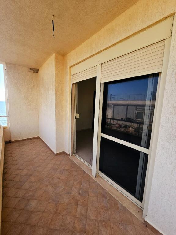 AT KAVAJA ROCK, WE SELL 1+1 APARTMENT, SEA VIEW, FIRST LINE