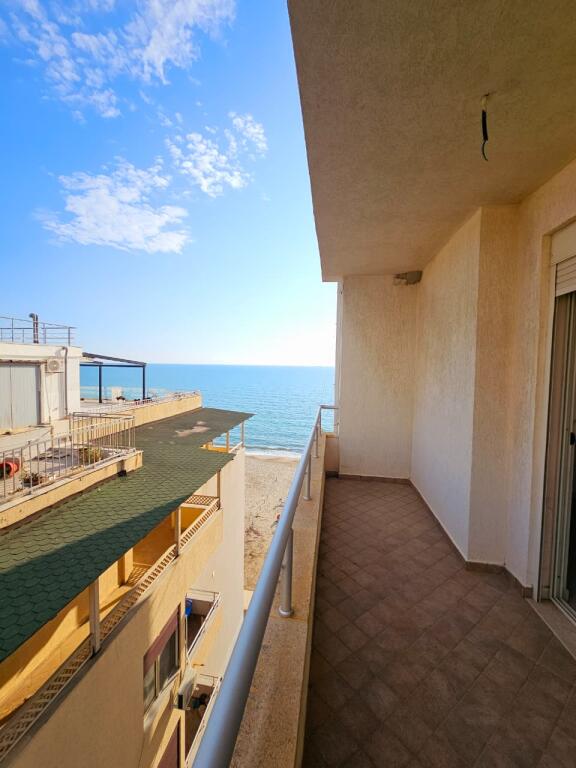 AT KAVAJA ROCK, WE SELL 1+1 APARTMENT, SEA VIEW, FIRST LINE
