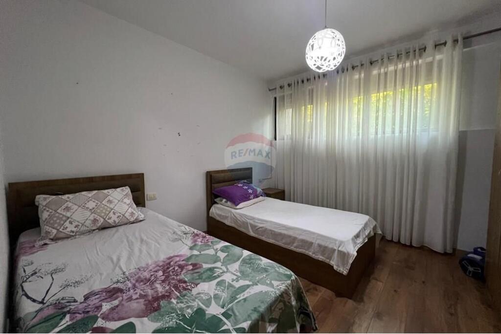APARTAMENT 2+1+ POST PARKIMI TEK KOPSHTI BOTANIK