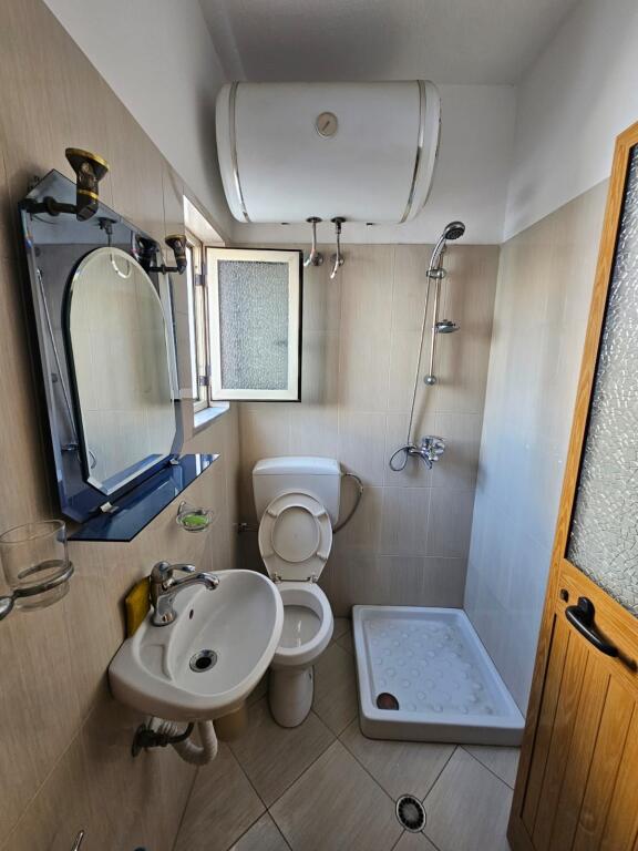 HOUSE BUILDING + BUSINESS PREMISES NEAR THE STADIUM