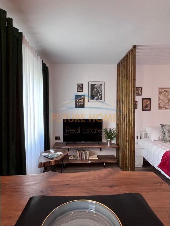 Qira, Garsoniere, 21 Dhjetori