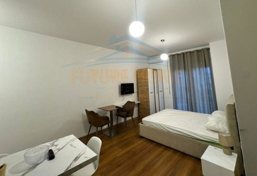 Qira, Garsoniere, Kodra e Diellit, Tiranë