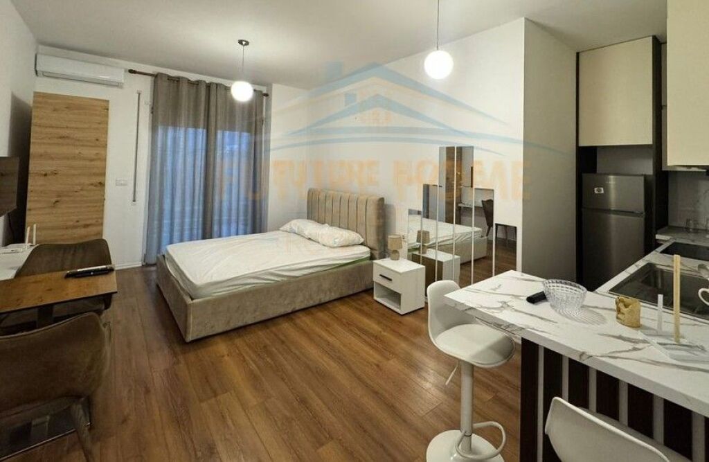 Qira, Garsoniere, Kodra e Diellit, Tiranë