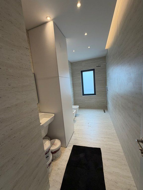 Modern 1+1 apartment plus parking space for rent near the center of Tirana!