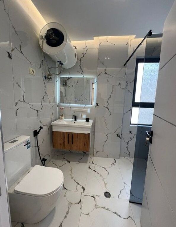 Shitet 2+1 tek rruga Kavajes, Pallati me Shigjeta