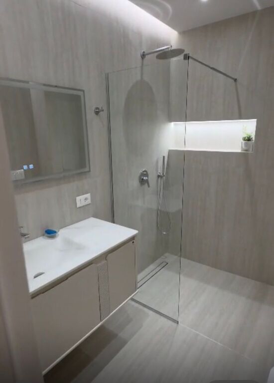 Ambjent me qera perballe Coin