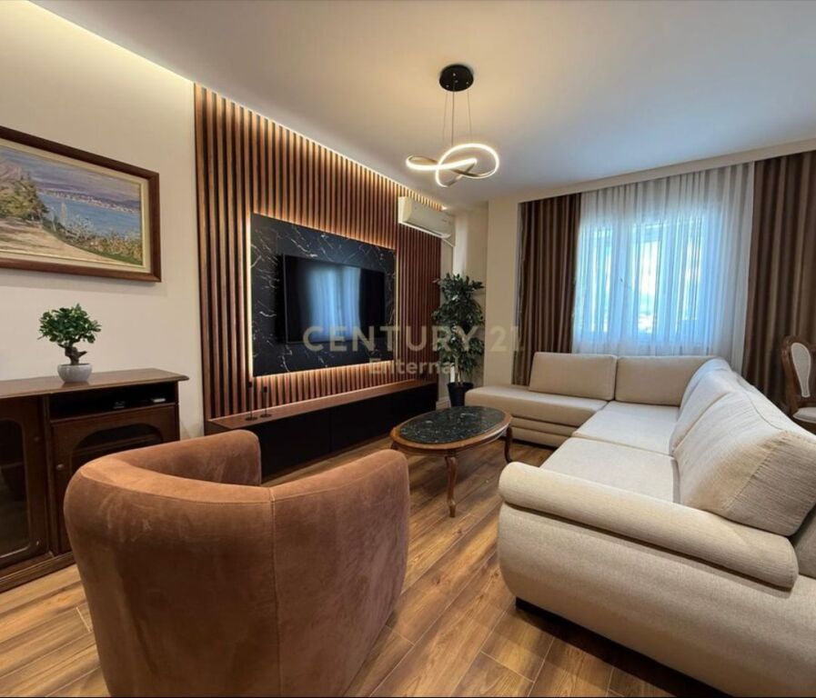 Në një nga zonat më të kërkuara të Tiranës, Mine Peza, ofrohet për shitje një apartament elegant 2+1+2 me sipërfaqe 102 m², i menduar për një jetesë komode dhe moderne , orjentimi Veri-Lindje ne sallon , nga dhomat e gjumit Jug .  Organizimi perfekt i hapësirës përfshin një sallon të bollshëm dhe të ndriçuar natyralisht, kuzhinë funksionale, dy dhoma gjumi komode , dy tualete duke garantuar rehati maksimale për familjen tuaj. Dy ballkonet shtojnë vlerë të veçantë, duke ofruar hapësirë relaksi dhe ajër të pastër gjatë gjithë ditës , ashensori nis nga kati 1.  Apartamenti karakterizohet nga ndriçim i bollshëm natyral, planimetri e rregullt dhe pozicion strategjik pranë çdo shërbimi të nevojshëm: shkolla, markete, transport publik dhe qendra biznesi.  Cmimi eshte ne lek 250 Milion .  • Për më shumë informacion, ju lutemi na kontaktoni!