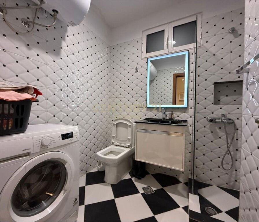 Në një nga zonat më të kërkuara të Tiranës, Mine Peza, ofrohet për shitje një apartament elegant 2+1+2 me sipërfaqe 102 m², i menduar për një jetesë komode dhe moderne , orjentimi Veri-Lindje ne sallon , nga dhomat e gjumit Jug .  Organizimi perfekt i hapësirës përfshin një sallon të bollshëm dhe të ndriçuar natyralisht, kuzhinë funksionale, dy dhoma gjumi komode , dy tualete duke garantuar rehati maksimale për familjen tuaj. Dy ballkonet shtojnë vlerë të veçantë, duke ofruar hapësirë relaksi dhe ajër të pastër gjatë gjithë ditës , ashensori nis nga kati 1.  Apartamenti karakterizohet nga ndriçim i bollshëm natyral, planimetri e rregullt dhe pozicion strategjik pranë çdo shërbimi të nevojshëm: shkolla, markete, transport publik dhe qendra biznesi.  Cmimi eshte ne lek 250 Milion .  • Për më shumë informacion, ju lutemi na kontaktoni!