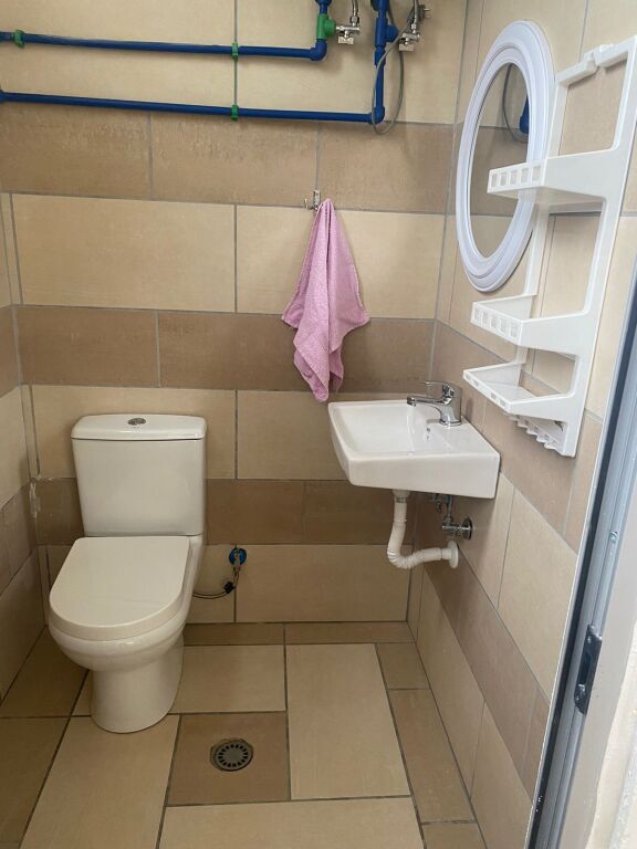 Garsionere 27000leke.Pallati me shigjeta