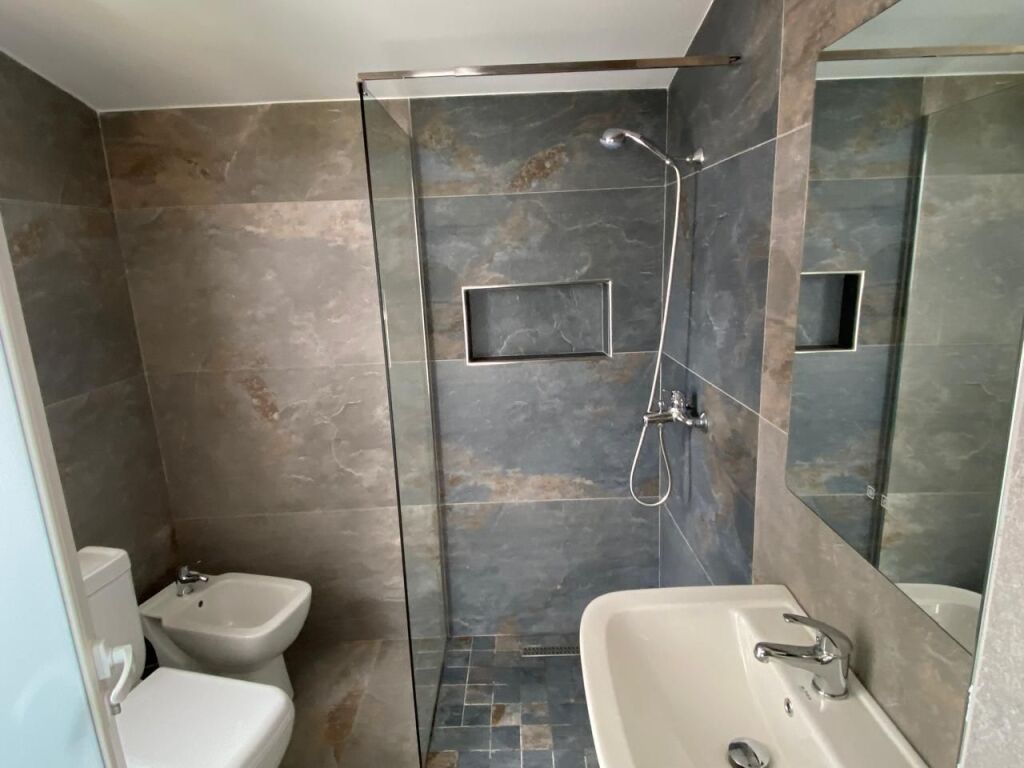 STUDIO APARTMENT 27000 LEKE.FORMER ELECTRIC MARKET.BUILDING WITH ANTENNAS