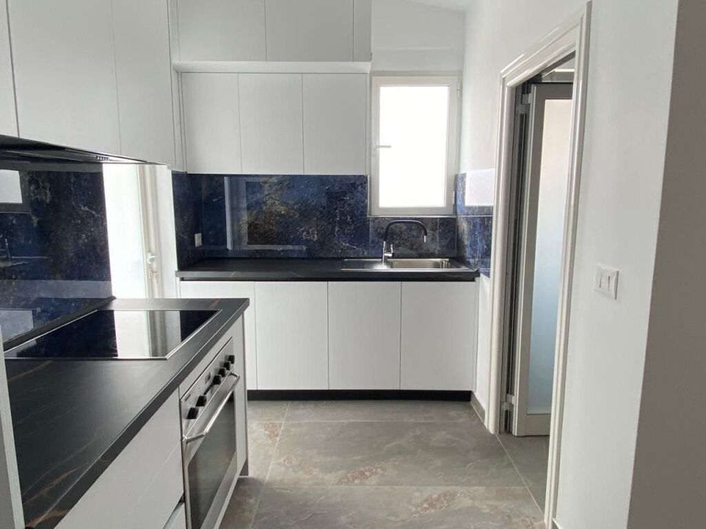 STUDIO APARTMENT 27000 LEKE.FORMER ELECTRIC MARKET.BUILDING WITH ANTENNAS