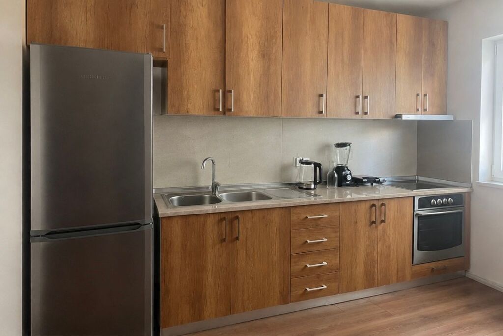 At Komuna Parisit, a 1+1 apartment is for rent in a new building on the second floor!