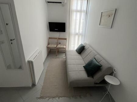 A 1+1 apartment is available for rent near QSUT, behind Hotel Viktoria.